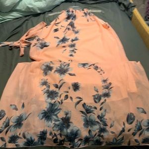 Rose pink dress with blue/black toned flowers.
